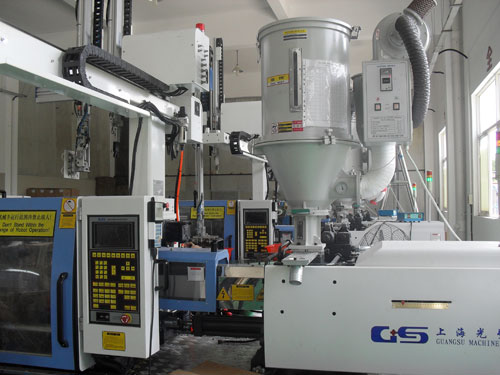 Injection molding machinery